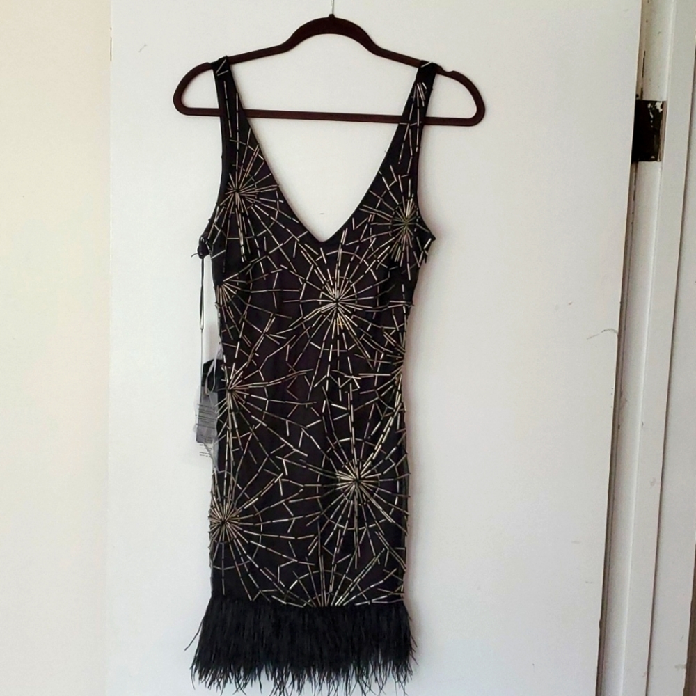 Sequenced feather cocktail dress